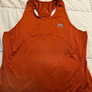 Tracksmith size m twilight tank. Color burnt orange/rust. Mint condition
